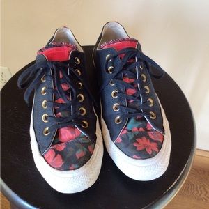Women’s black& floral converse all stars.